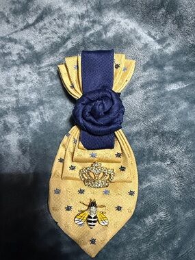 Yellow and Navy Tie Necklace with Gold Crown and a Bumblebee with rhinestones.